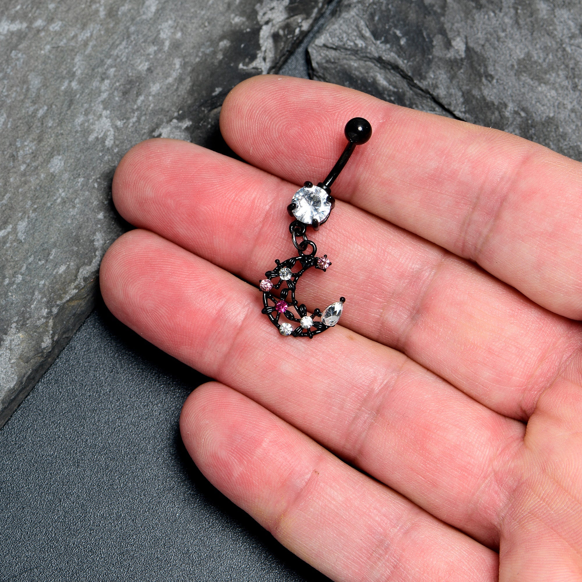 BodyCandy Clear Pink CZ Gem Black Flower Moon Dangle Belly Ring — detail close-up