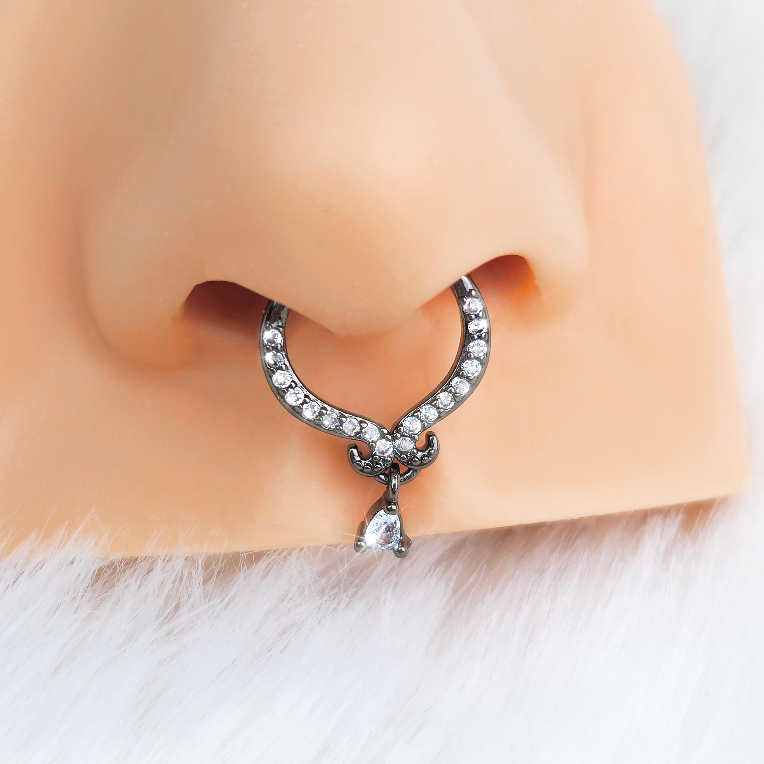 BodyCandy 16G 3/8 Clear CZ Gem Black Elegant Curves Hinged Segment Ring — detail close-up