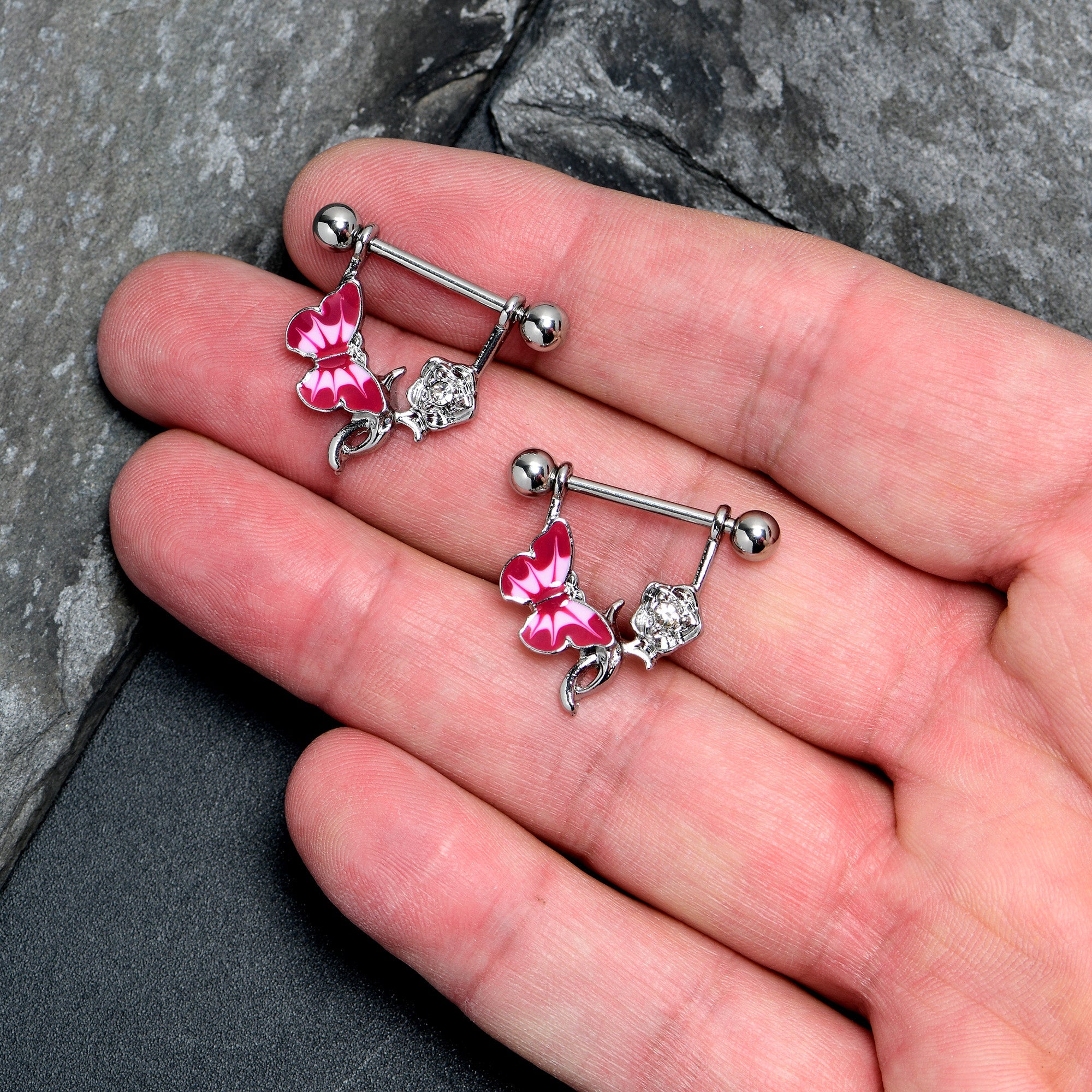 BodyCandy 14G 9/16 Butterfly Pink Rose Flower Dangle Nipple Ring Set — lifestyle context