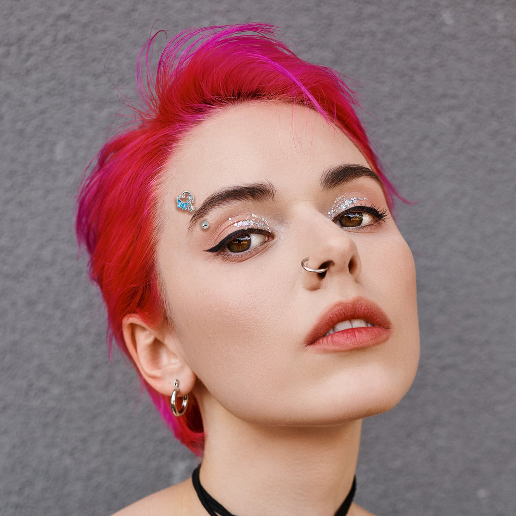 BodyCandy 16G 5/16 Clear Gem Butterfly Rose Flower Blue Curved Eyebrow Ring — side view