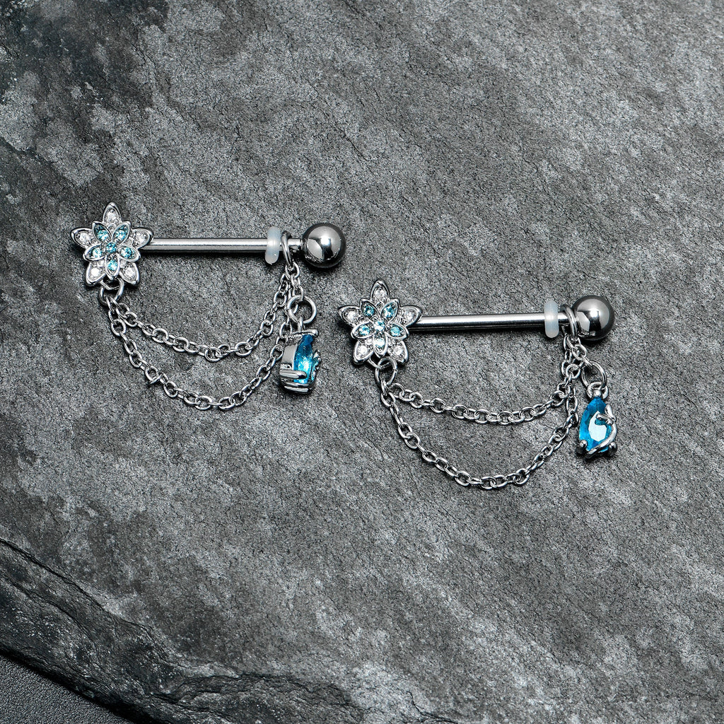 BodyCandy 14G 9/16 Blue CZ Gem Snowflake Flower Chain Dangle Nipple Ring Set — lifestyle context