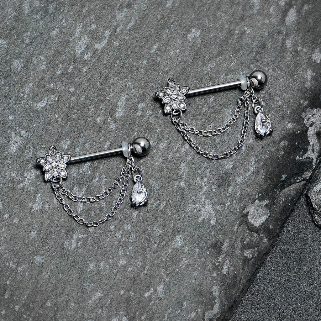 BodyCandy 14G 9/16 Clear CZ Gem Snowflake Flower Chain Dangle Nipple Ring Set — lifestyle context