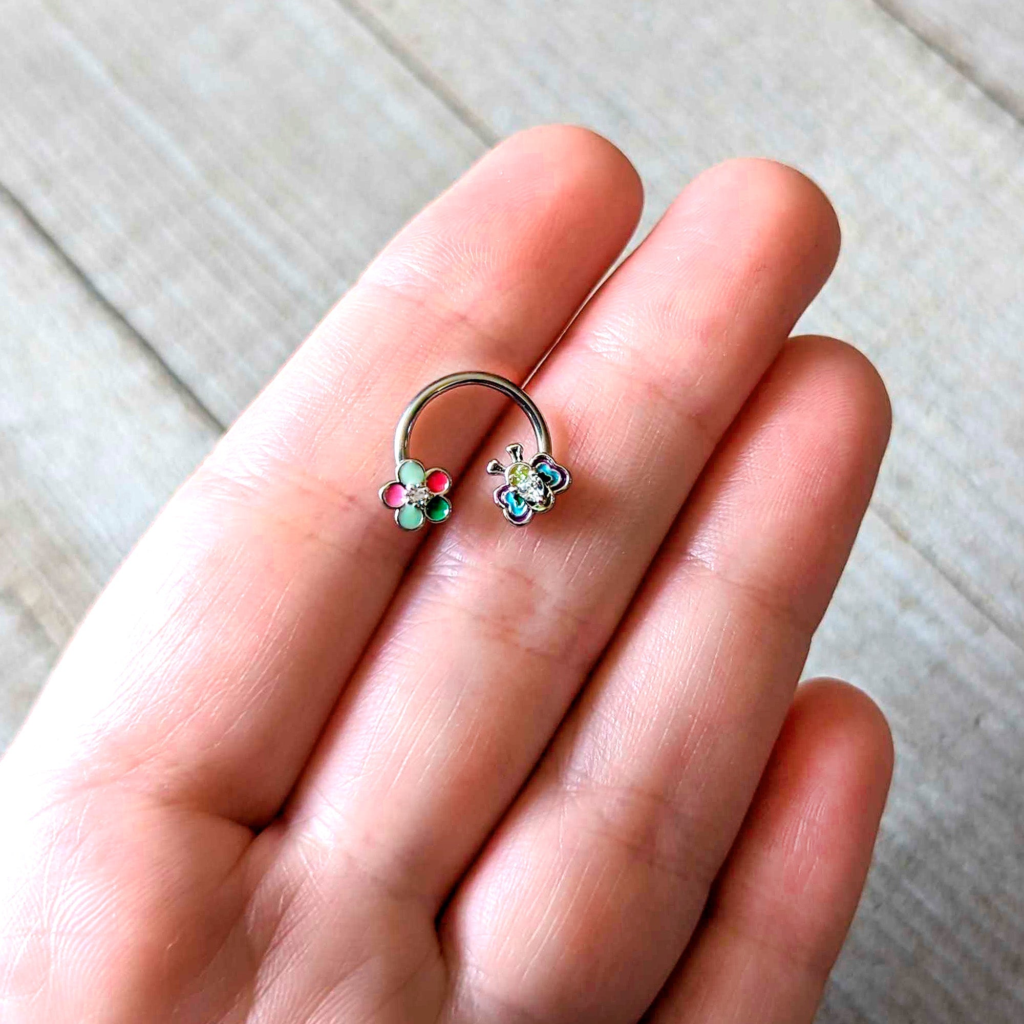 BodyCandy 16G 3/8 Clear CZ Gem Butterfly Love Bug Horseshoe Circular Barbell — detail close-up