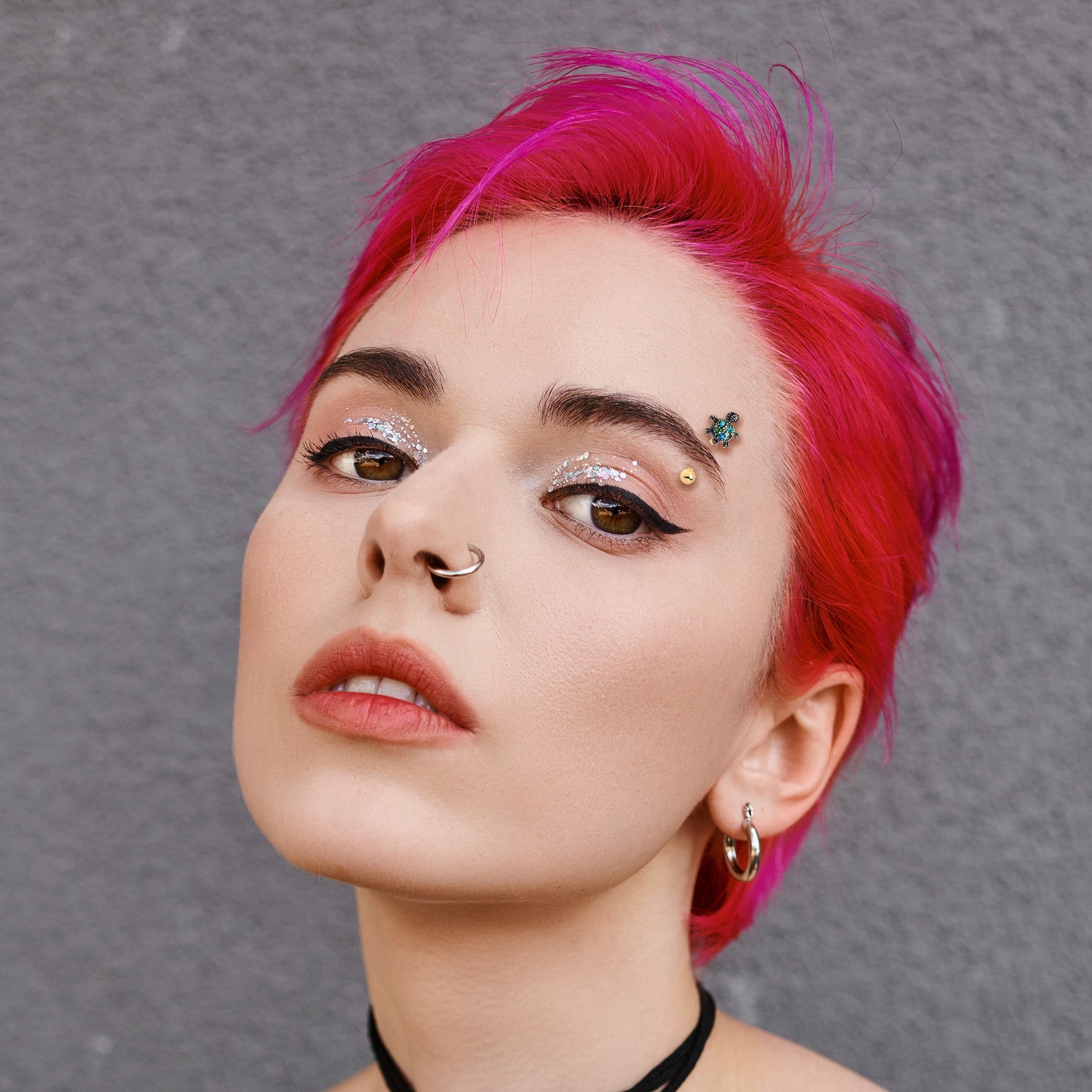 BodyCandy 16G 5/16 Blue Gem Gold Tone Sweet Sea Turtle Curved Eyebrow Ring — lifestyle context