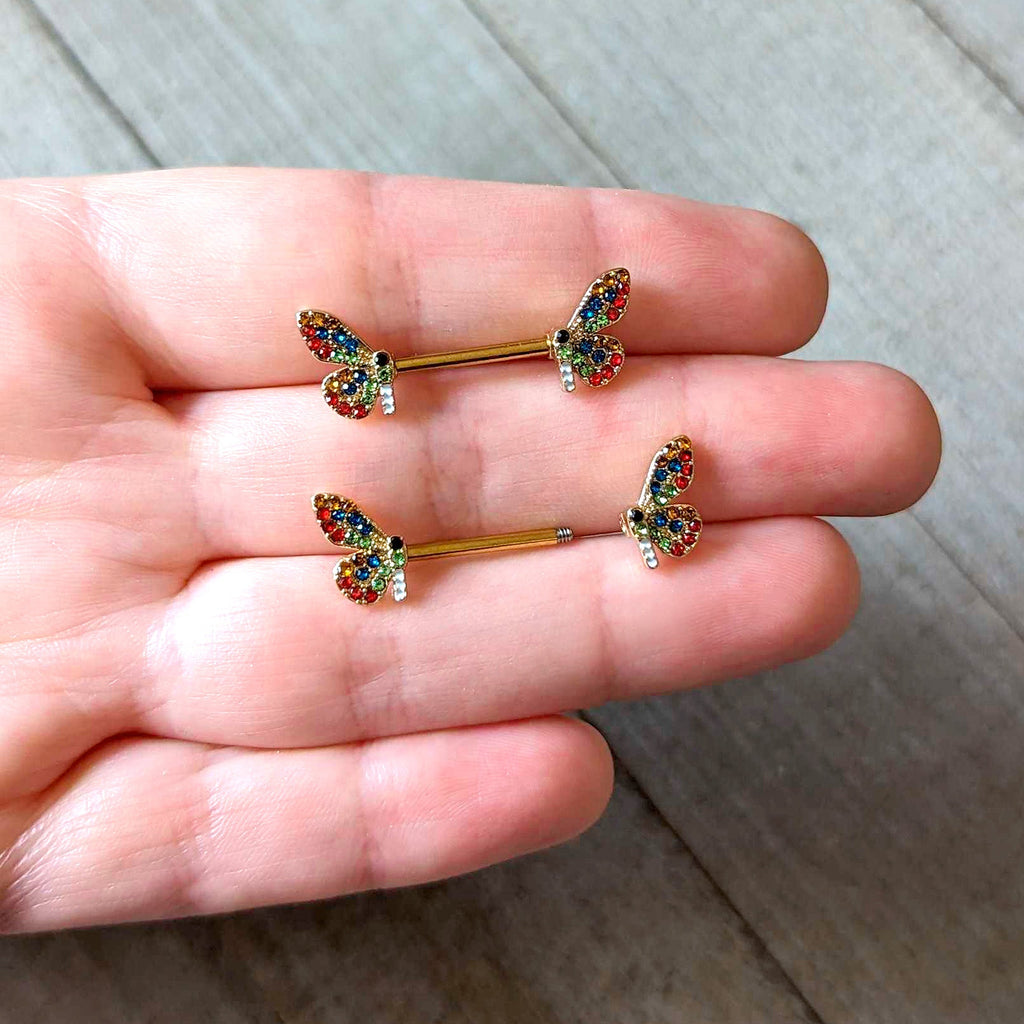 BodyCandy 14G 9/16 Red Blue Gem Gold Tone Butterfly Barbell Nipple Ring Set — lifestyle context