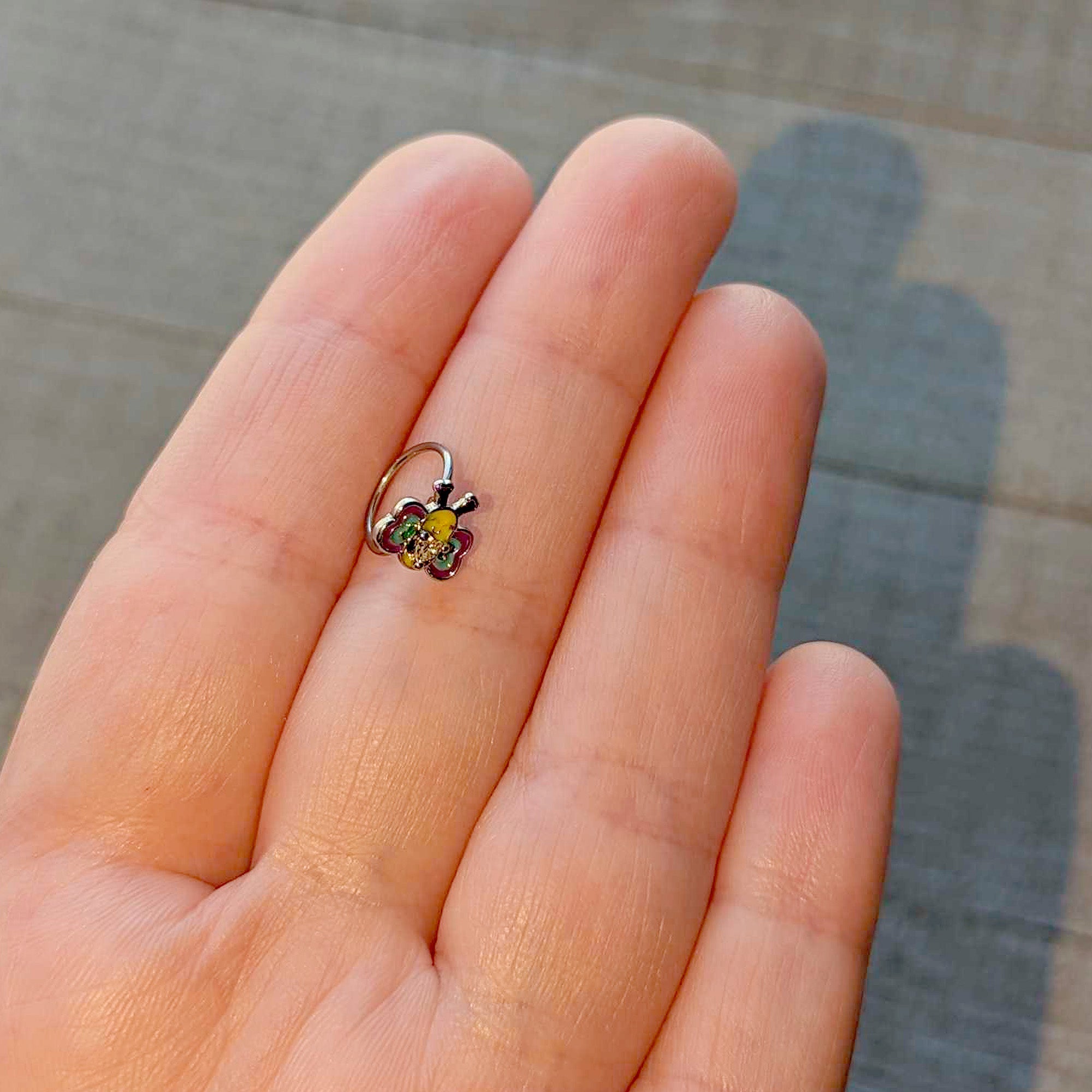 BodyCandy 20G 5/16 Clear CZ Gem Butterfly Love Bug Nose Hoop — side view