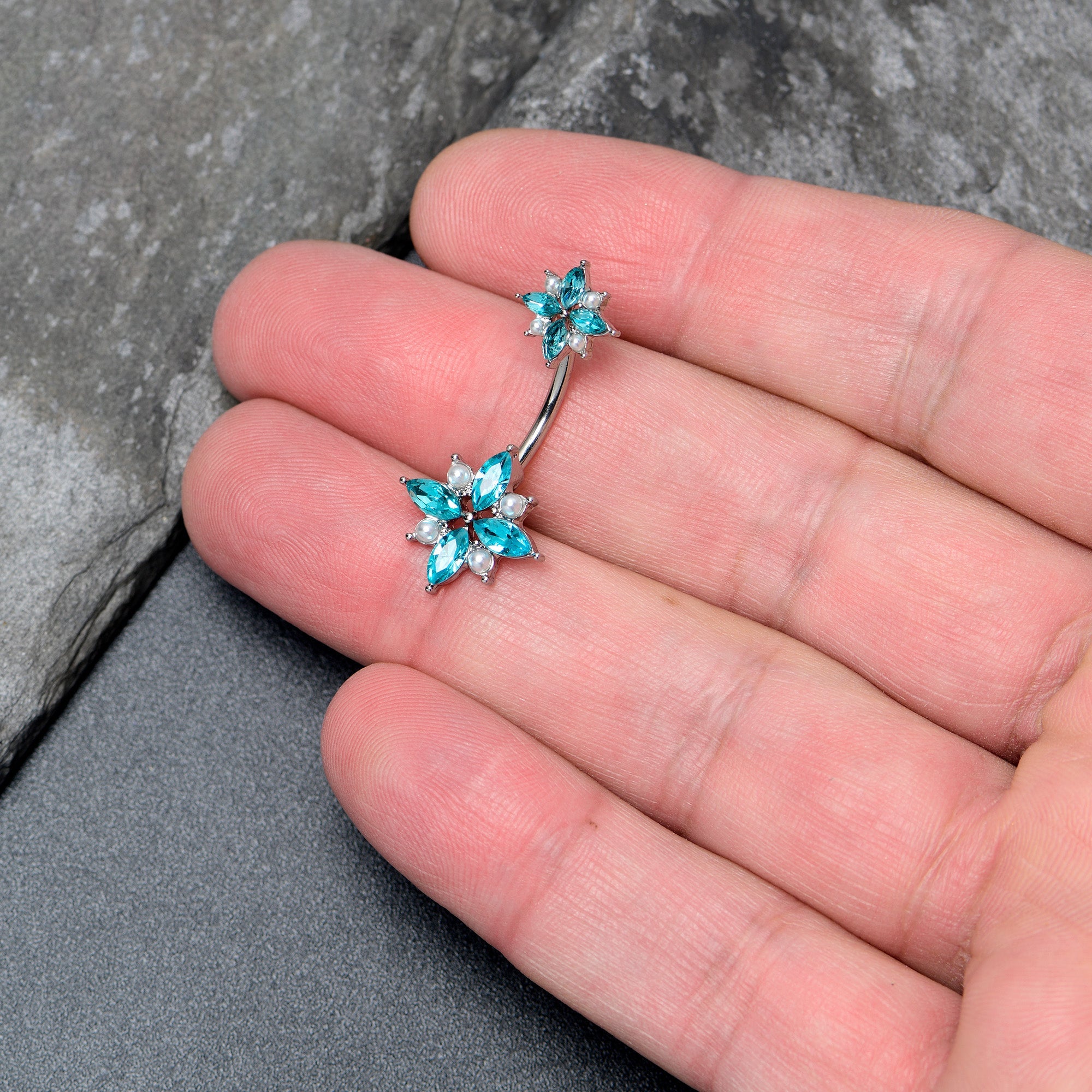 BodyCandy Blue Gem Star Power Double Mount Belly Ring — detail close-up