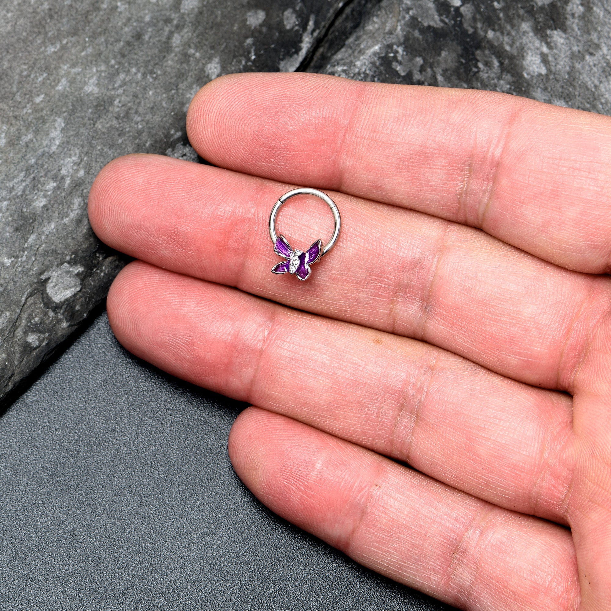 BodyCandy 16G 3/8 Clear Gem Chunky Butterfly Purple Hinged Segment Ring — lifestyle context