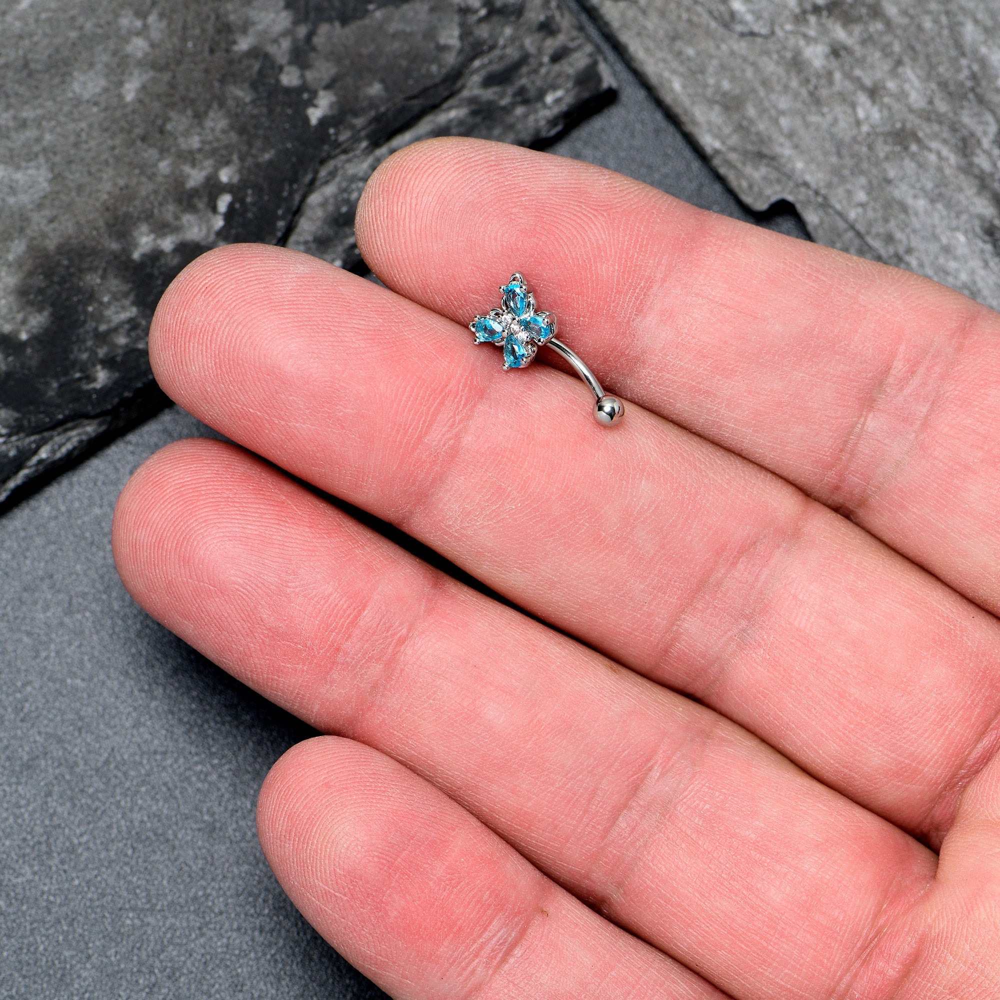 BodyCandy 16G 5/16 Blue Gem Baroque Beauty Butterfly Curved Eyebrow Ring — detail close-up