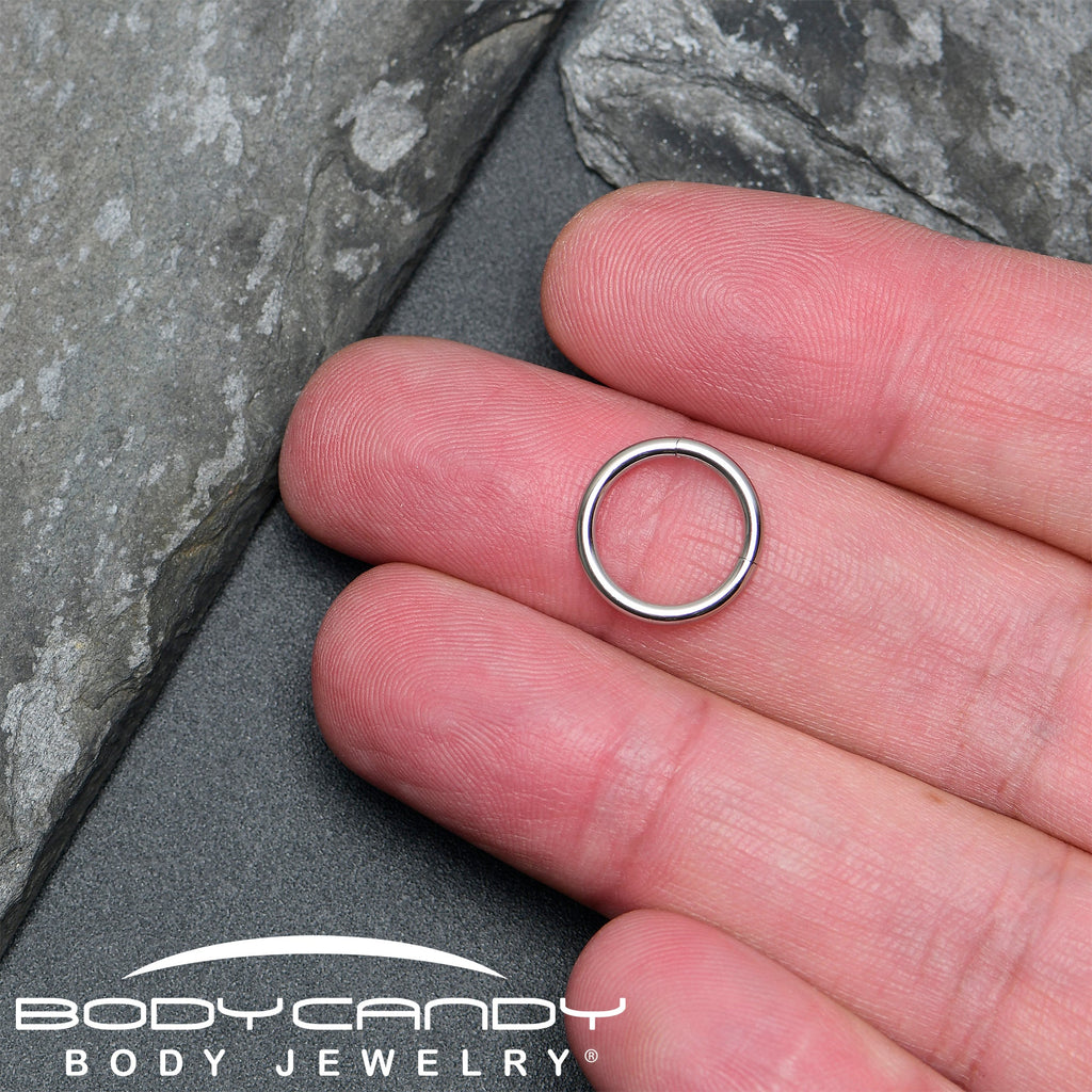 BodyCandy 14G 7/16 316L Surgical Steel Precision Hinged Segment Hoop — in-use photo