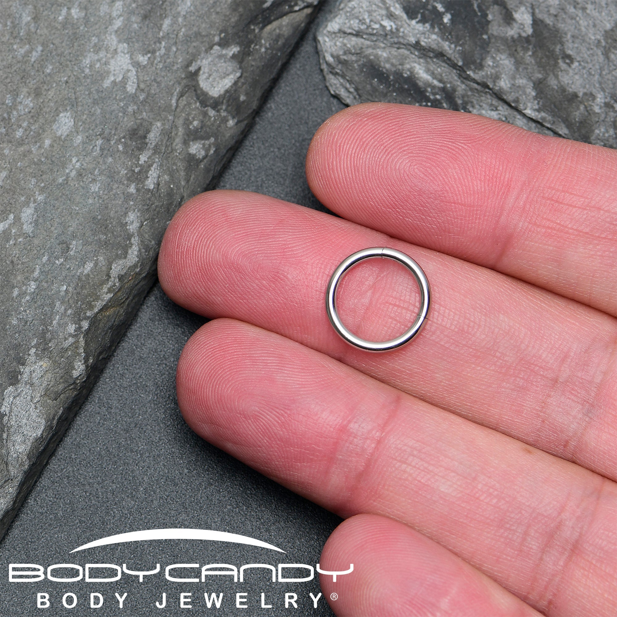 BodyCandy 14G 7/16 316L Surgical Steel Precision Hinged Segment Hoop — in-use photo