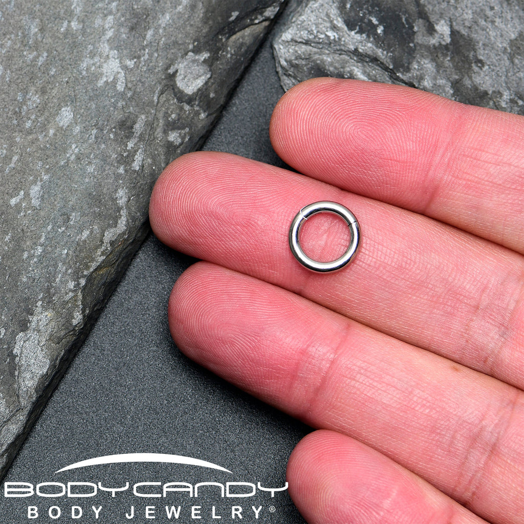 BodyCandy 12G 5/16 316L Surgical Steel Precision Hinged Segment Hoop — in-use photo