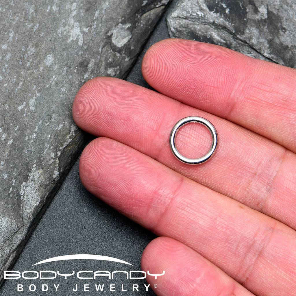 BodyCandy 12G 3/8 316L Surgical Steel Precision Hinged Segment Hoop — in-use photo