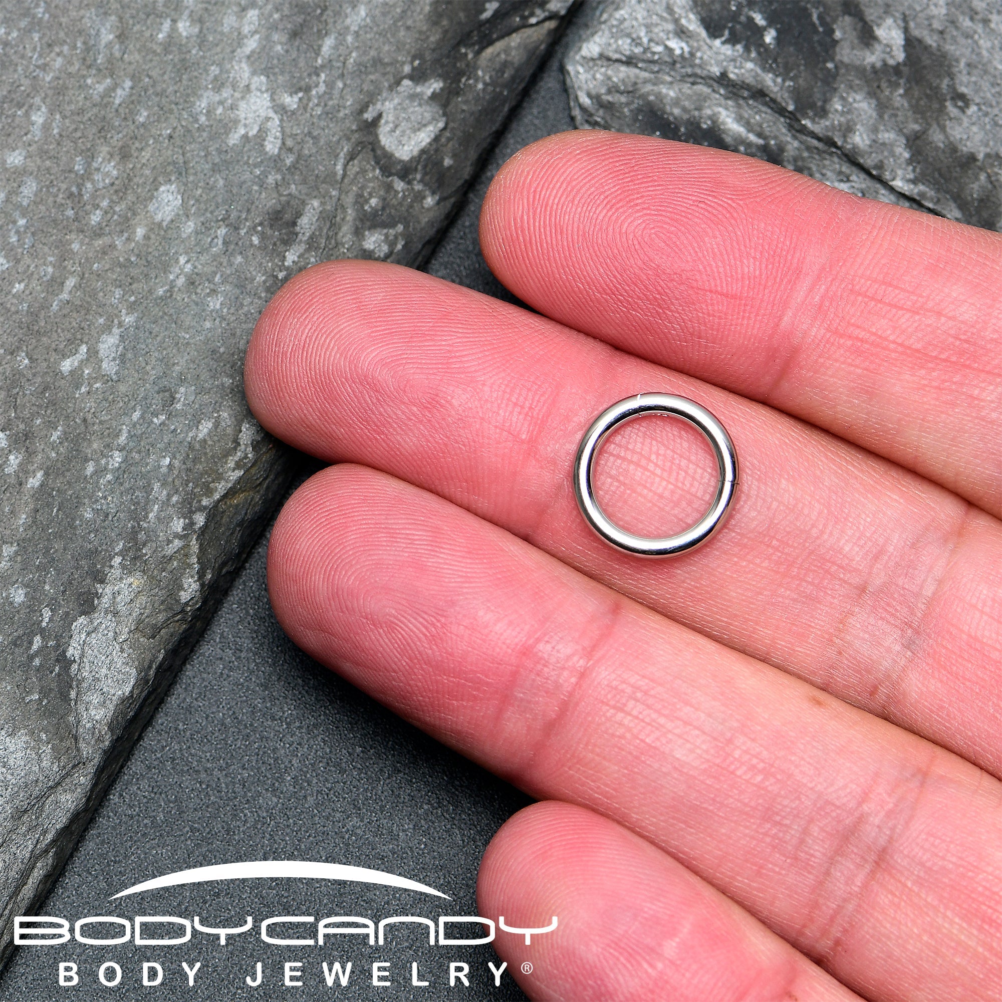 BodyCandy 12G 3/8 316L Surgical Steel Precision Hinged Segment Hoop — in-use photo