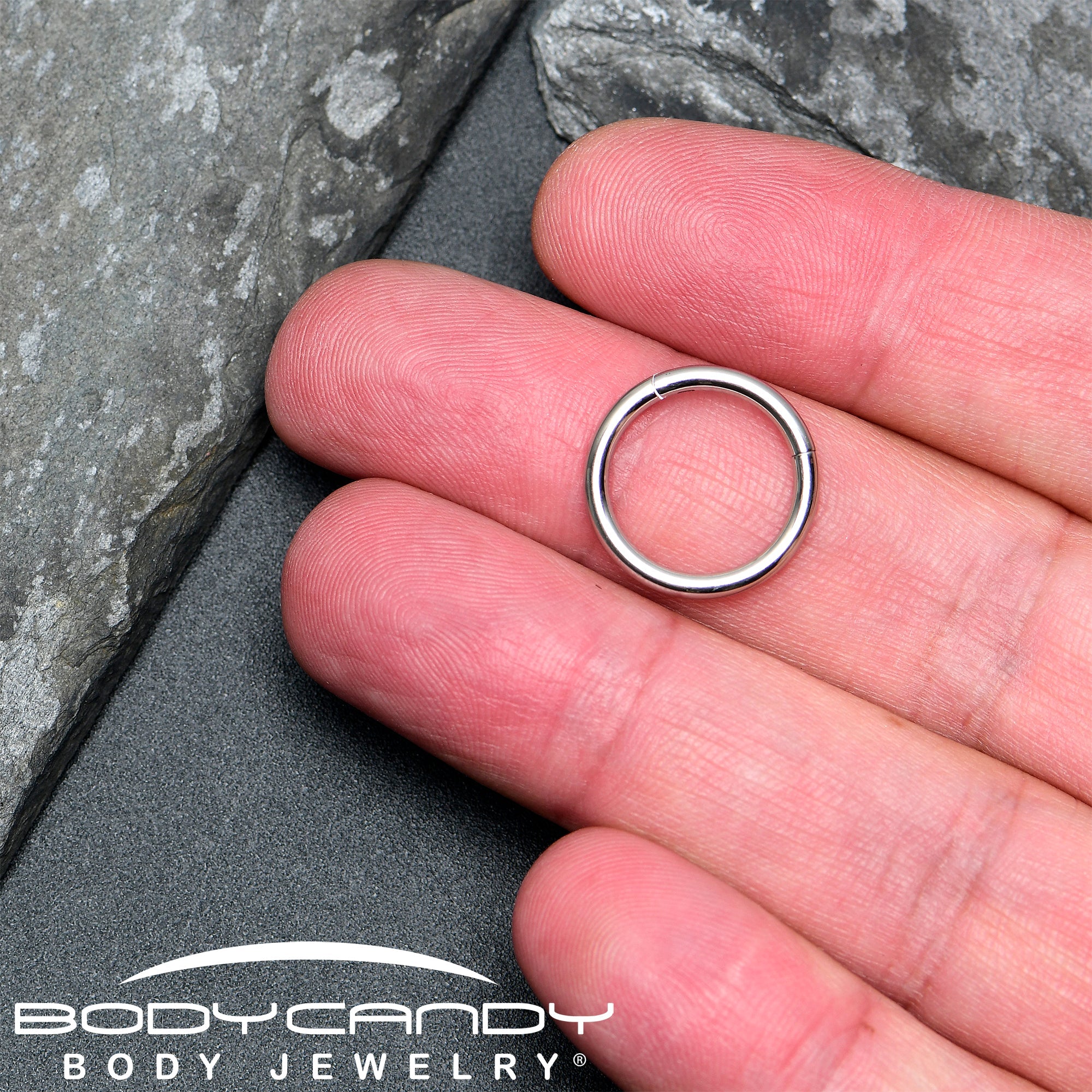 BodyCandy 12G 9/16 316L Surgical Steel Precision Hinged Segment Hoop — in-use photo