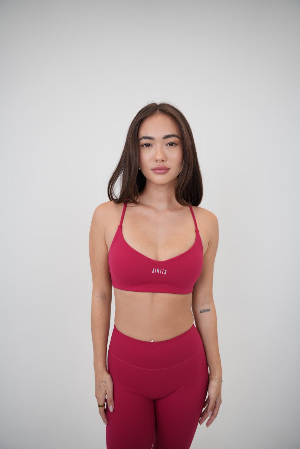 KIMITH BRAND I Live in Luxury Red Sports Bra — lifestyle context