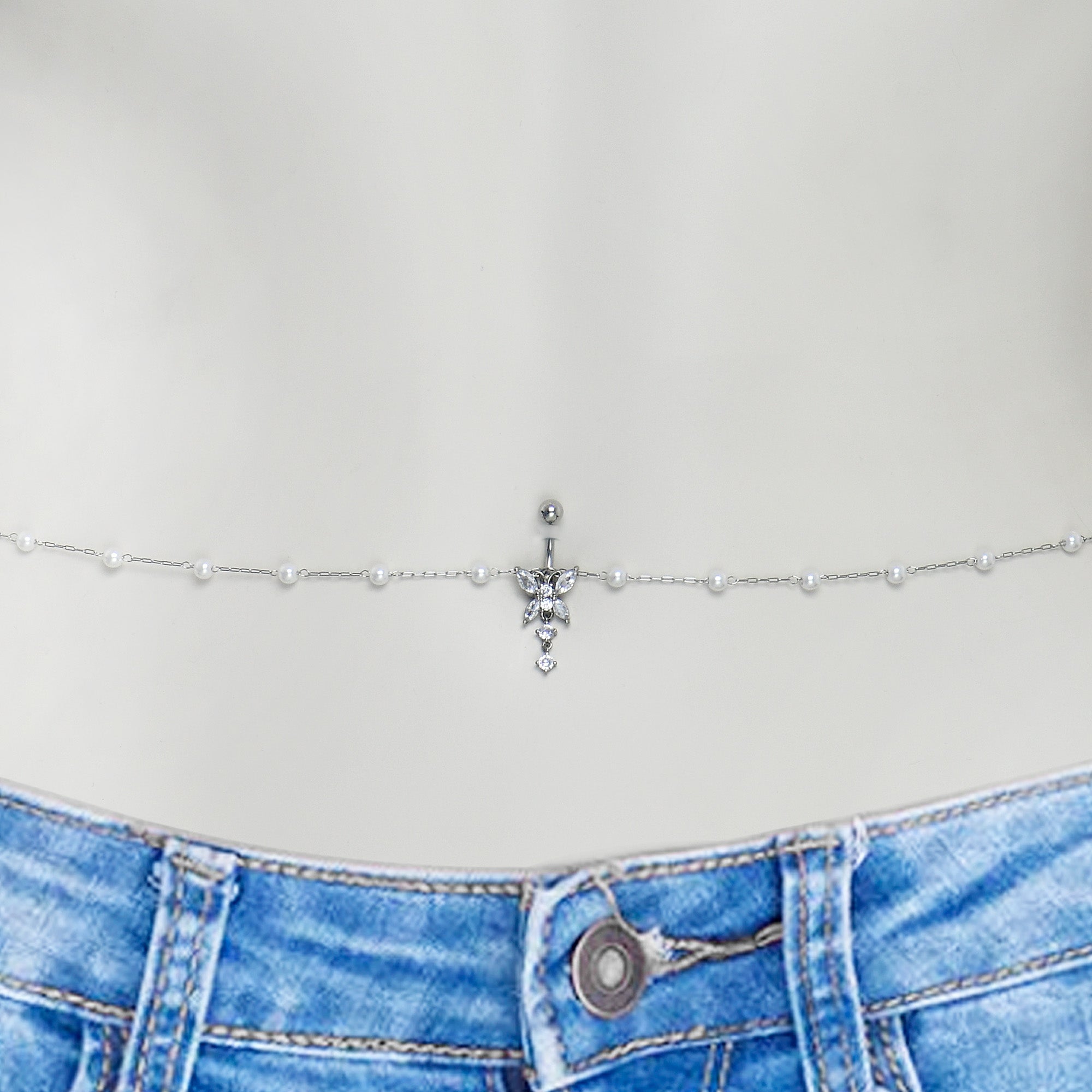 BodyCandy Clear CZ Gem Glam Butterfly Faux Pearl Dangle Belly Ring Belly Chain — detail close-up