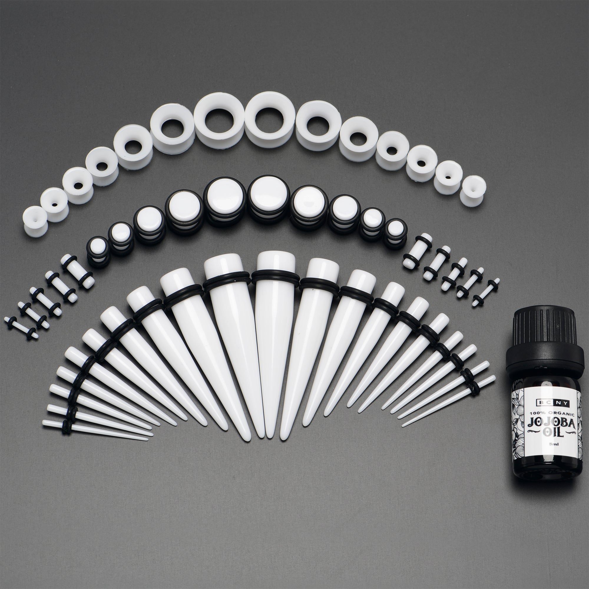 BodyCandy 14G to 1/2 White Acrylic 54 Piece Ear Stretching Kit with Jojoba Oil — alternative angle
