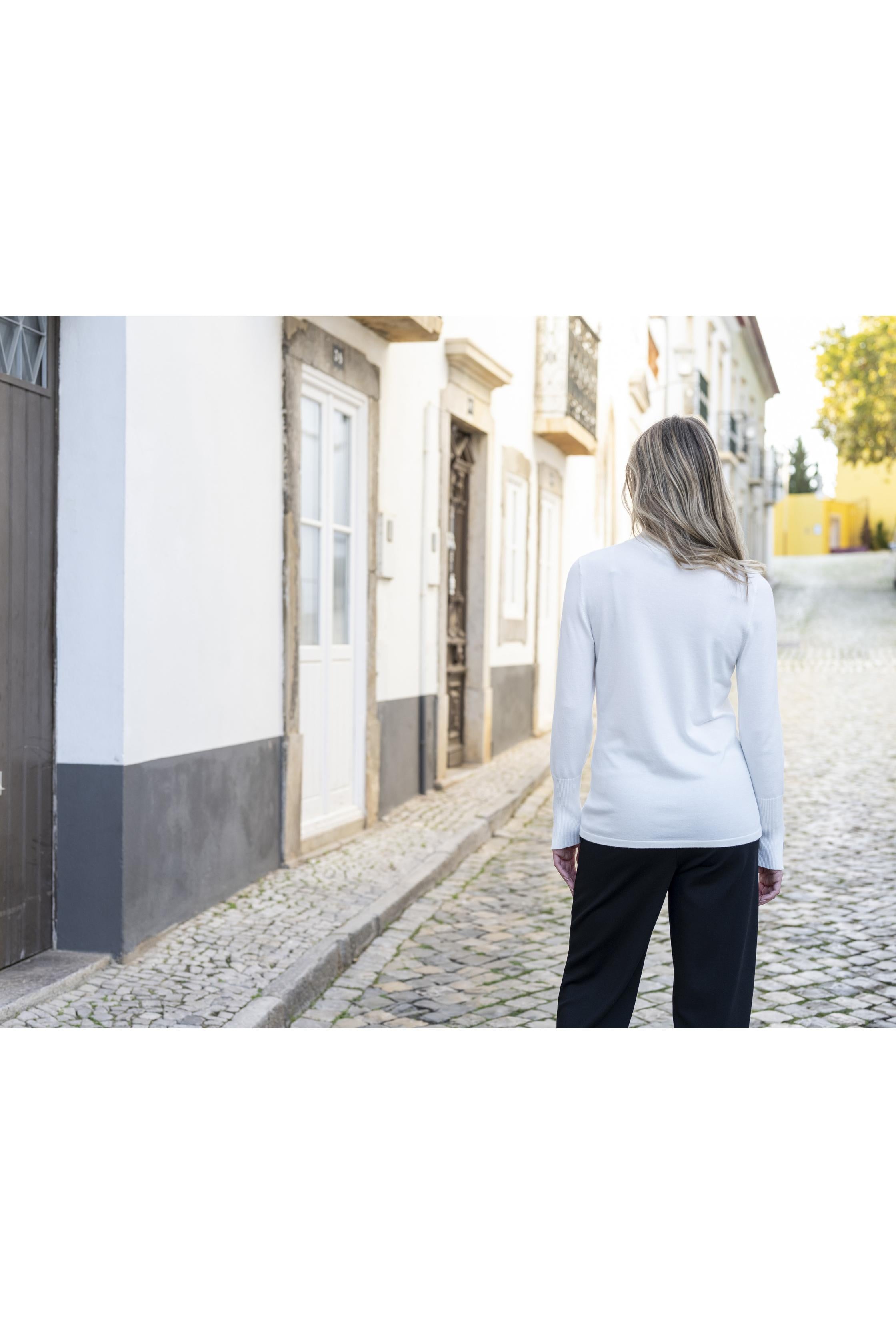 KADOU BOUTIQUE Chevron Knit Turtleneck Sweater — lifestyle context