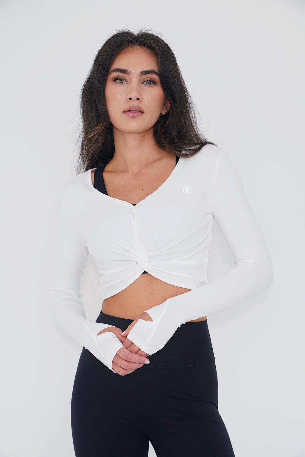KIMITH BRAND I Release Doubt Buttery Soft White Long Sleeve Crop Top — detail close-up