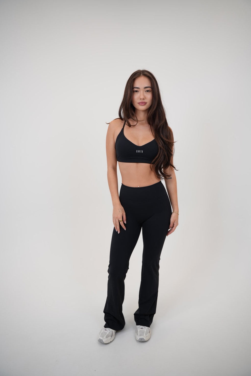 KIMITH BRAND I Live in Luxury Black Sports Bra — back view