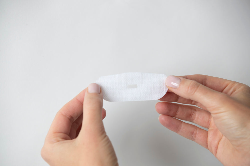 oi tape Vented Mouth Tape Sample 5-Pack — lifestyle bedside table