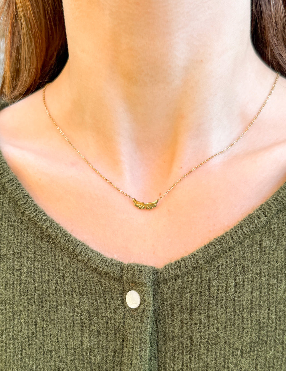 Elevated Faith Angel Wings Necklace — detail close-up