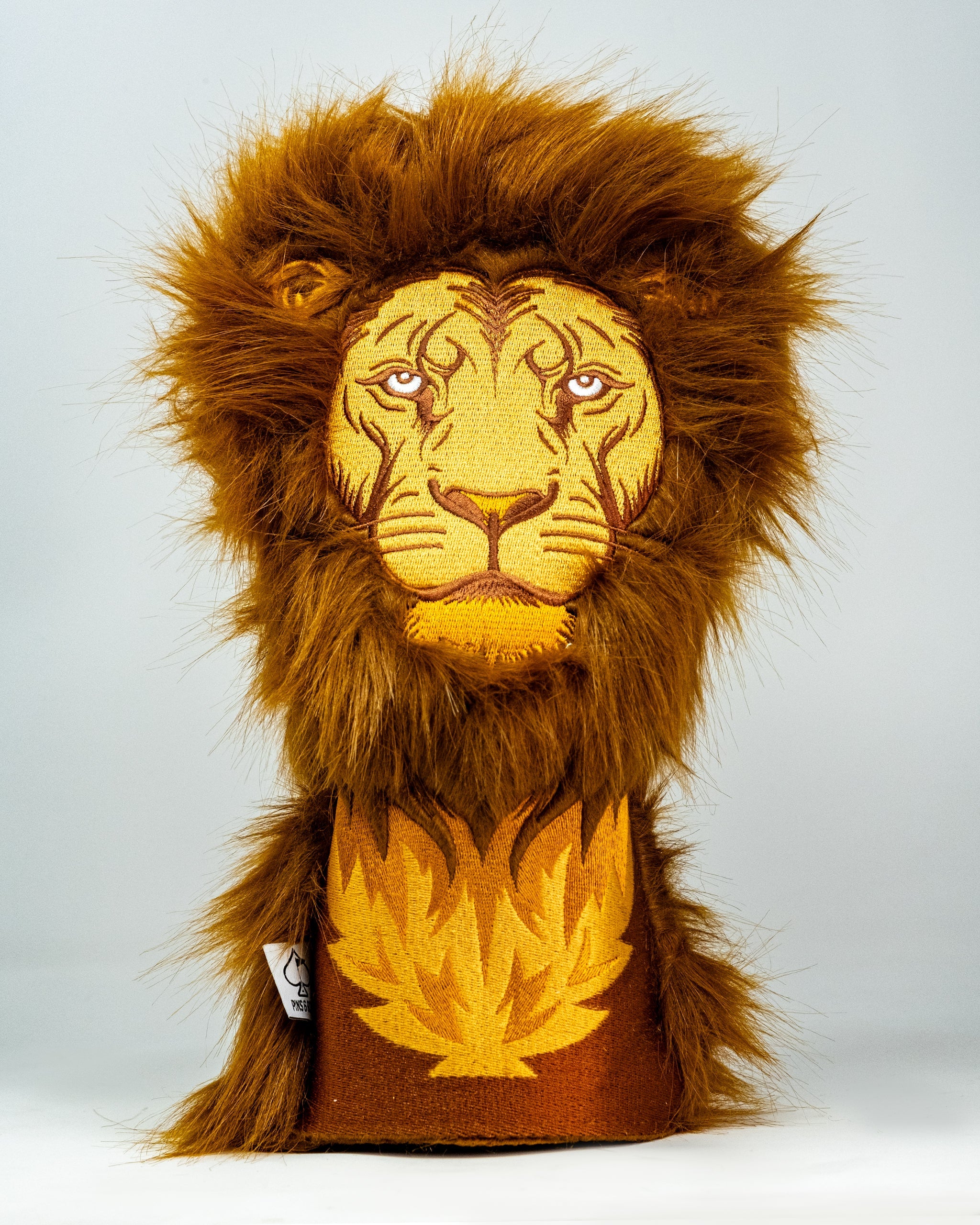 Pins and Aces Lion Driver Cover — flat-lay composition