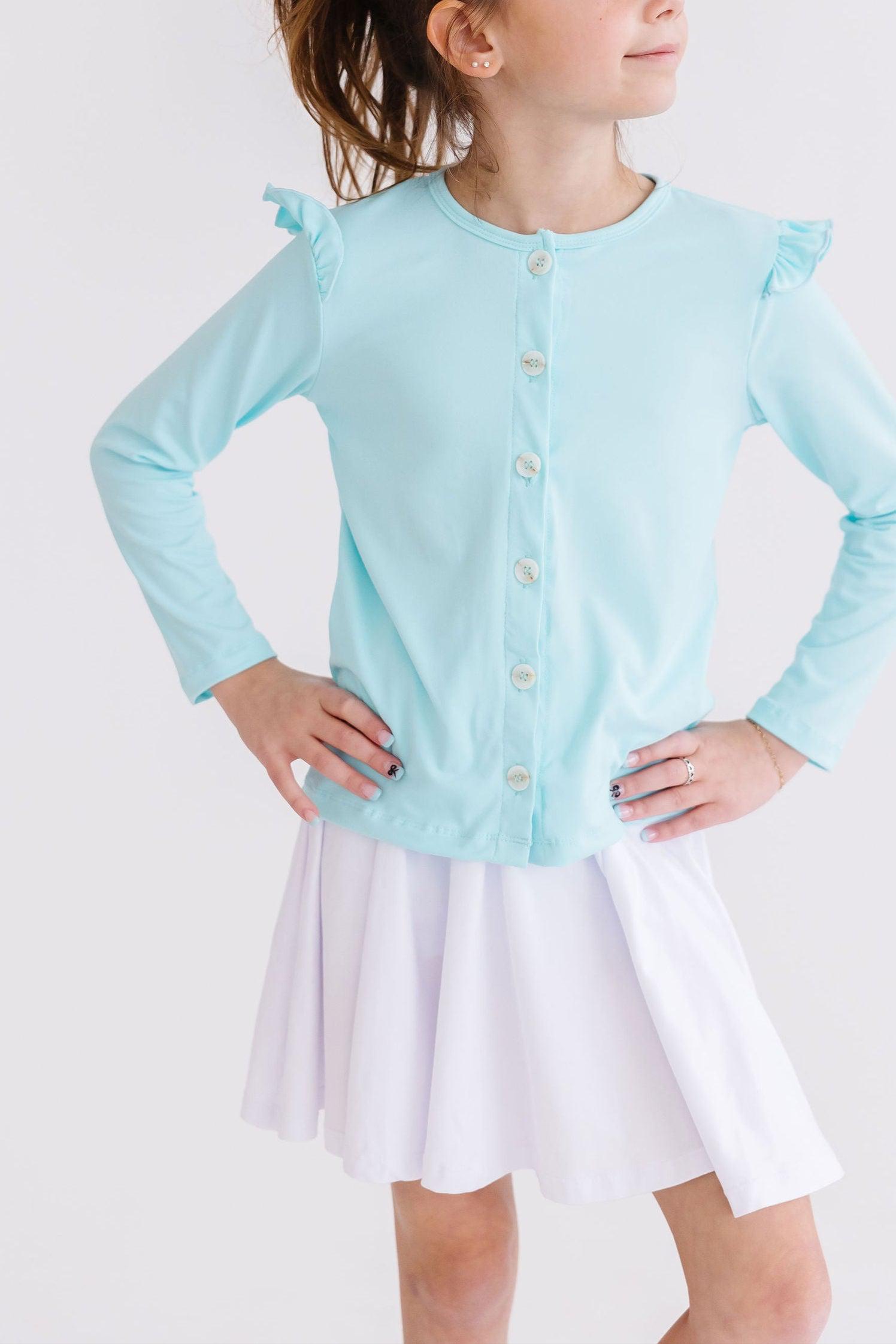 Mila & Rose ® Aqua Ruffle Cardigan — lifestyle context