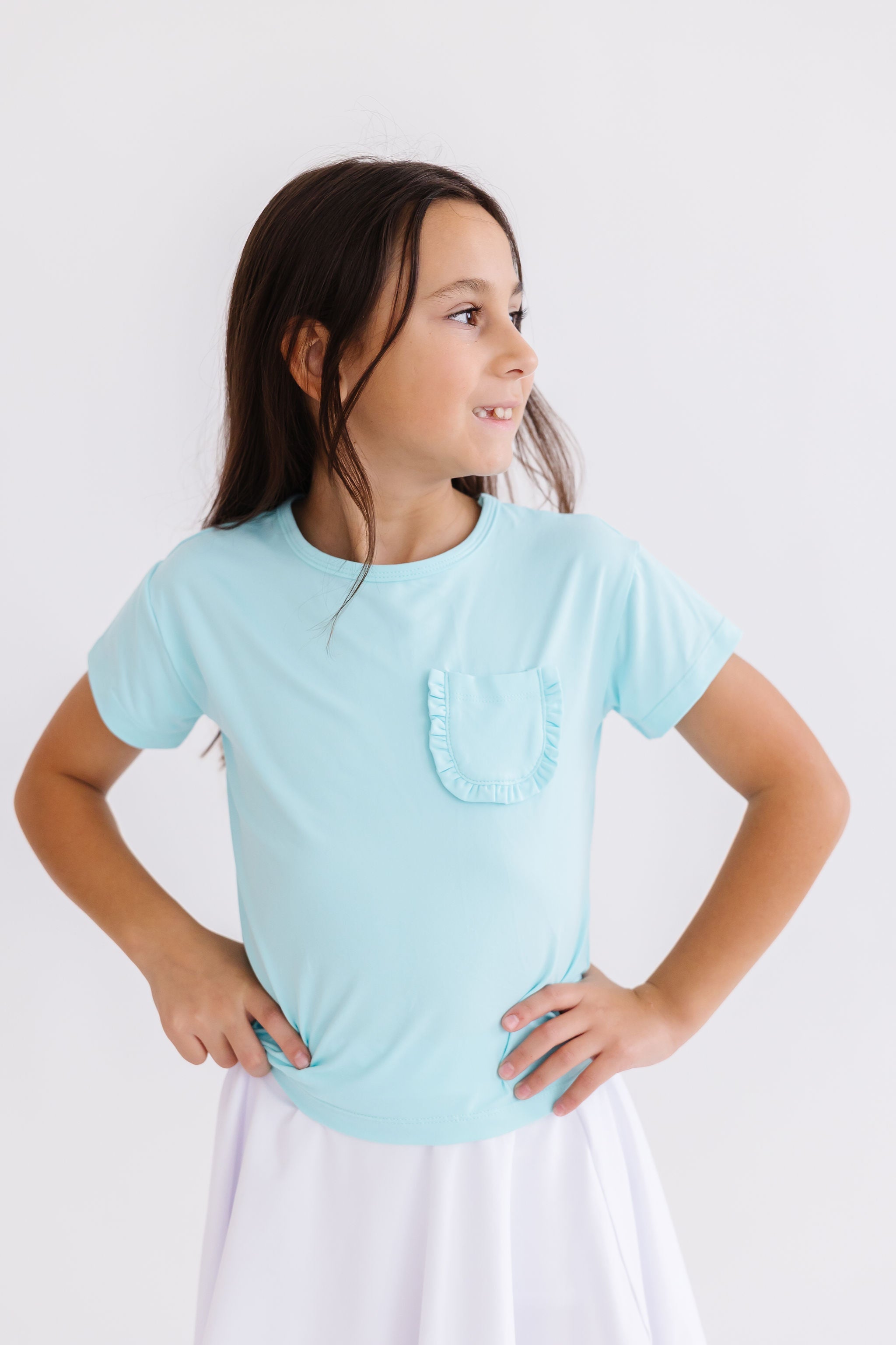 Mila & Rose ® Aqua Ruffle Pocket Tee — lifestyle context