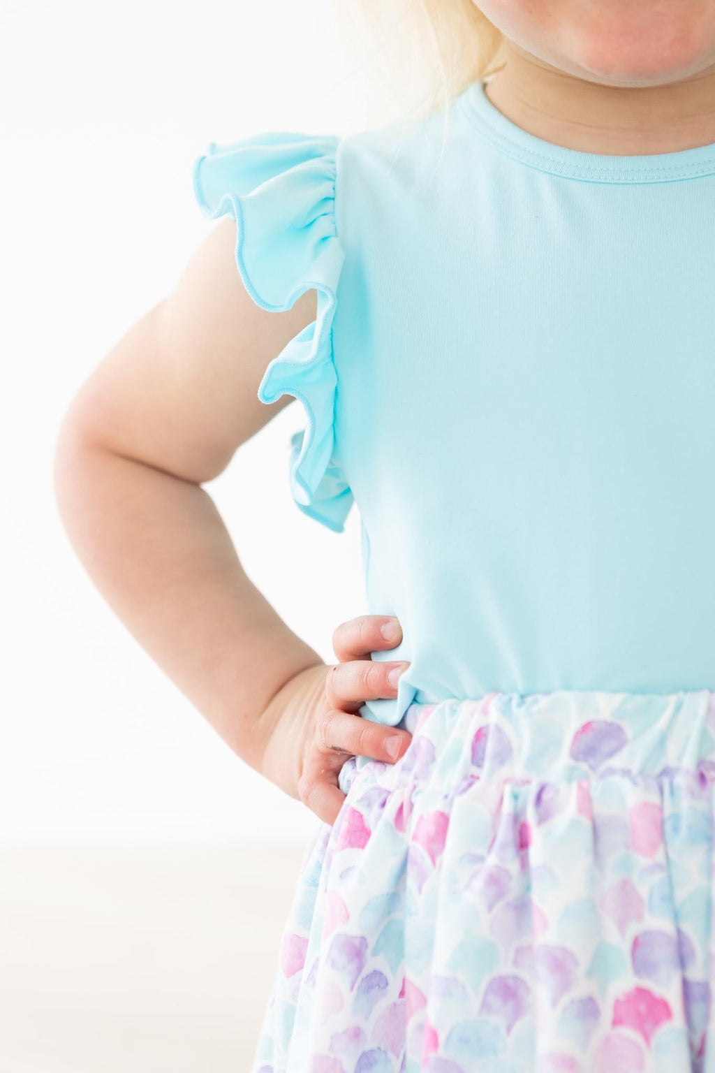 Mila & Rose ® Aqua S/S Ruffle Tee — in-use photo