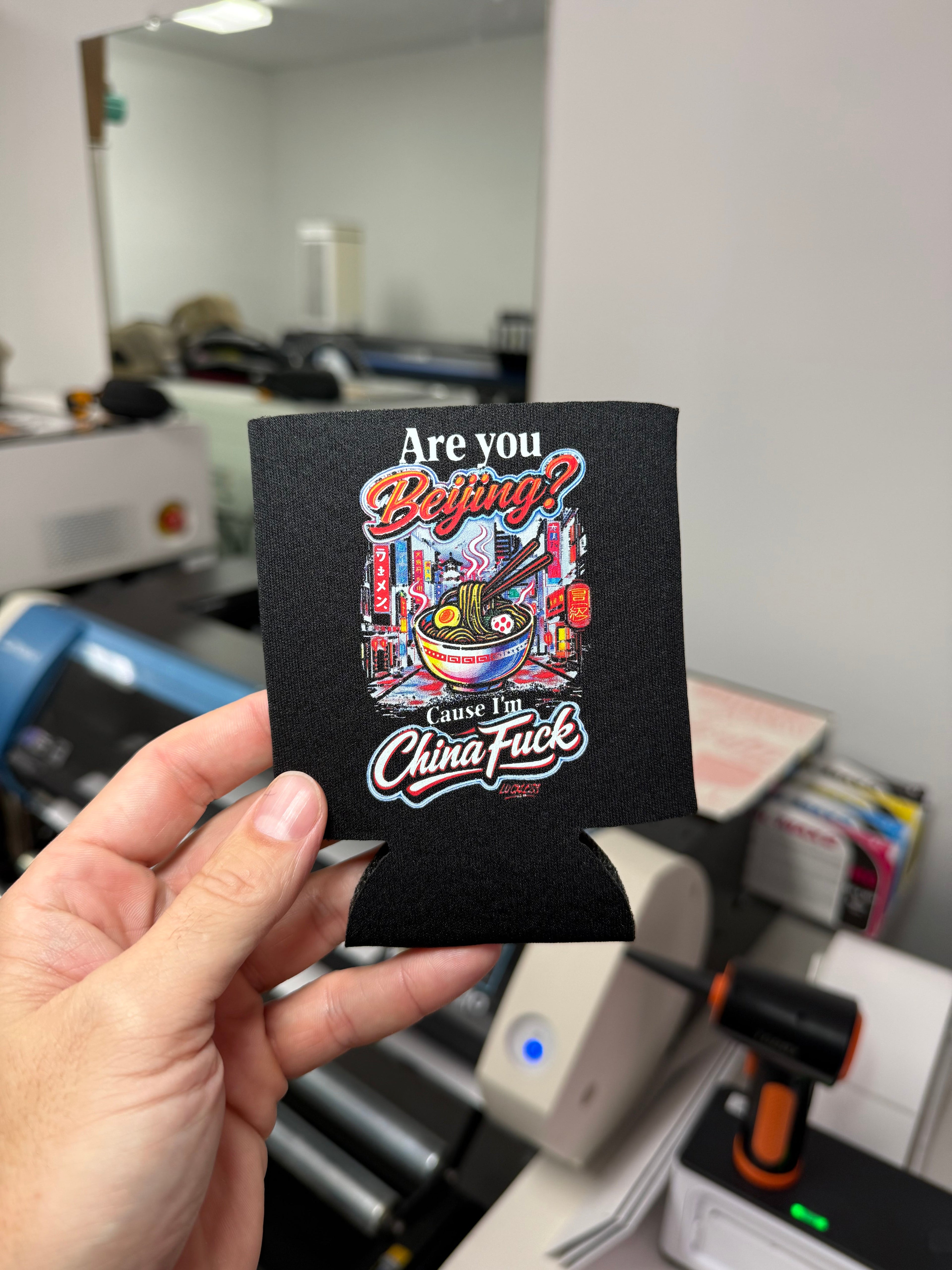 Luckless Outfitters Are You Beijing Koozie — detail close-up