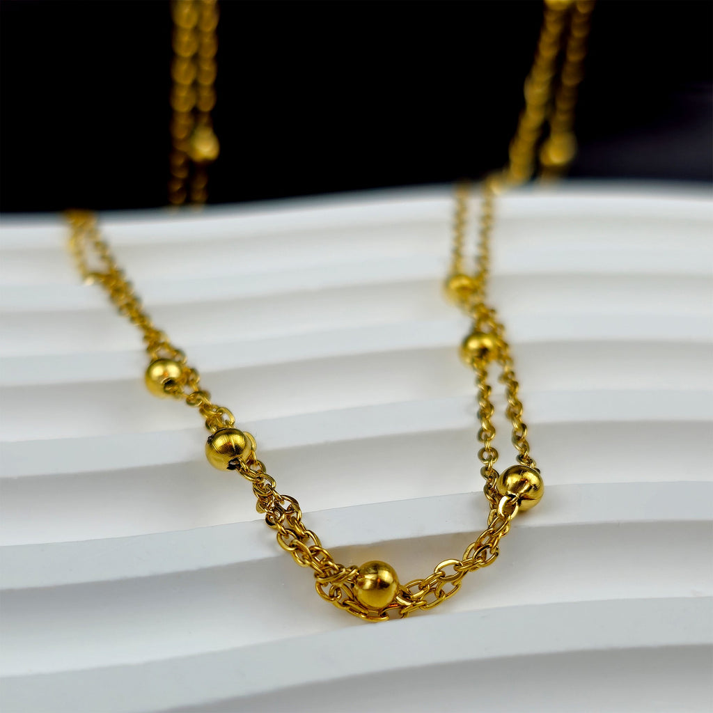 BodyCandy Stainless Steel Gold Tone PVD Ball Station Necklace Satellite Chain Double Necklace — detail close-up