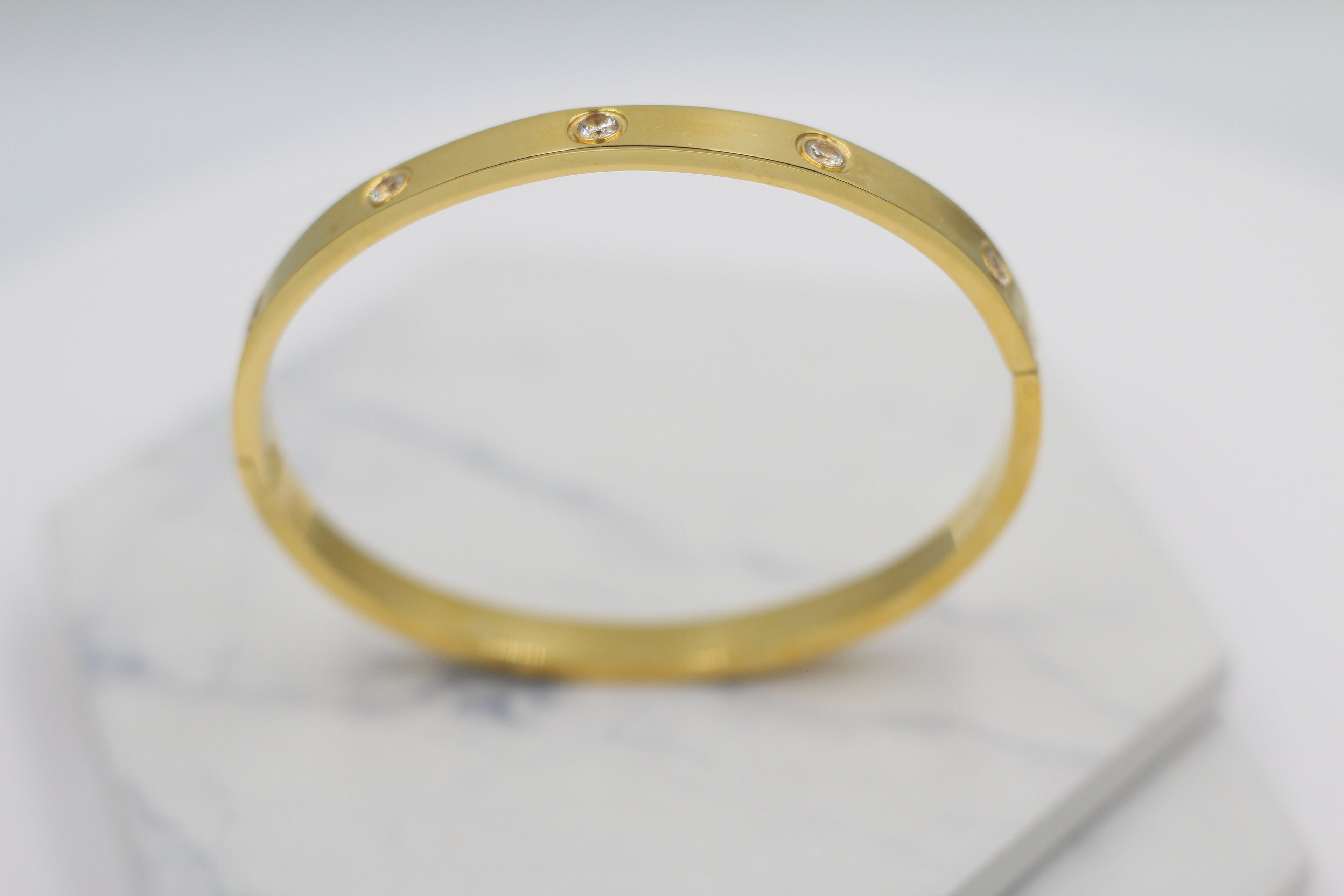 KADOU BOUTIQUE Sparkle Hinged Bangle — lifestyle context