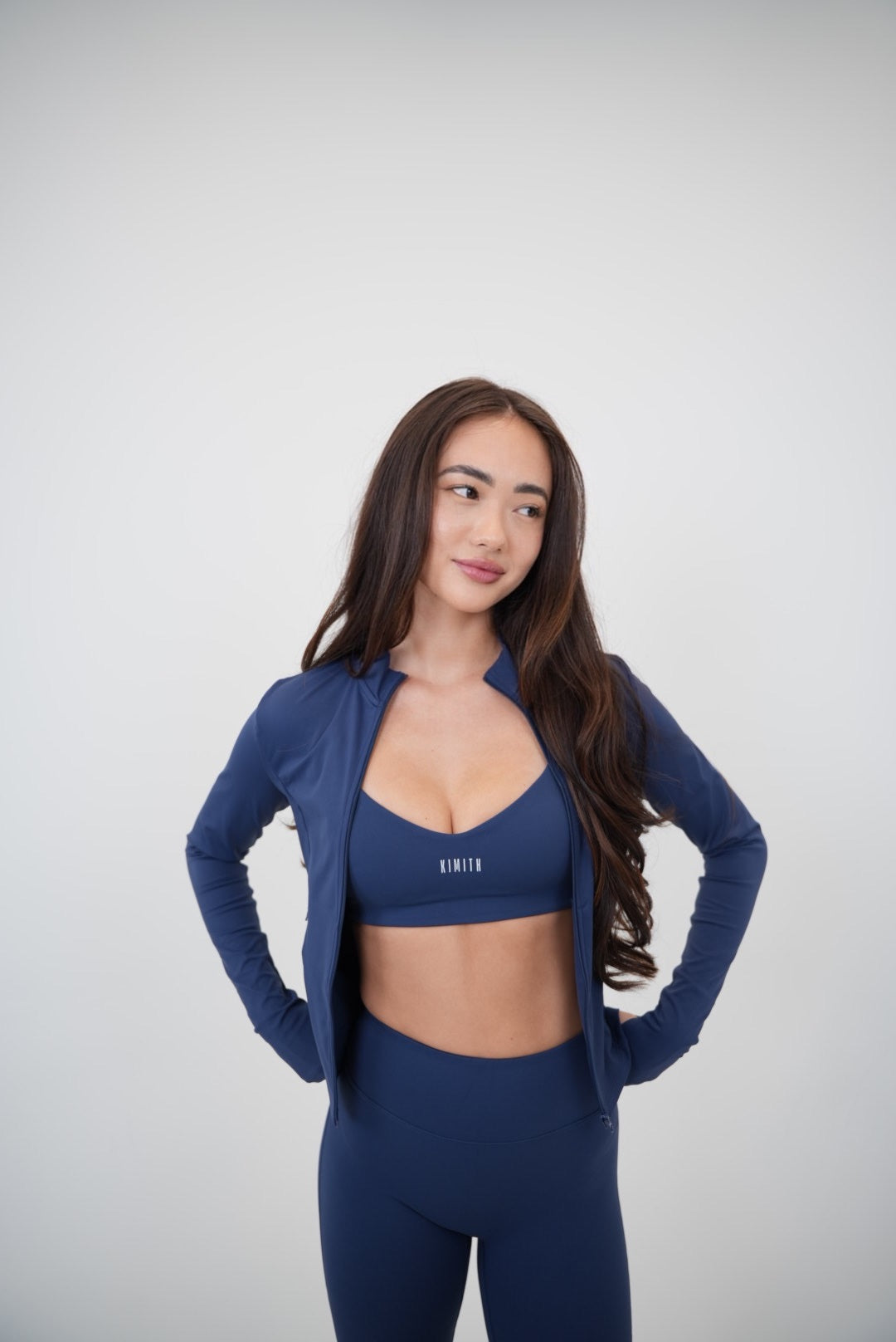 KIMITH BRAND I Live in Luxury Navy Blue Sports Bra — lifestyle context