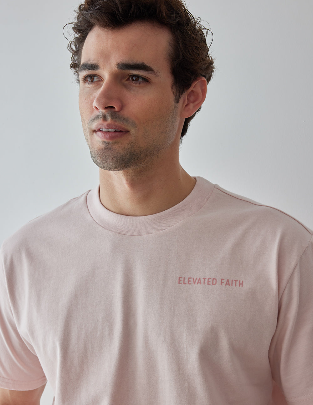 Elevated Faith Basics Lotus Unisex Tee — lifestyle context