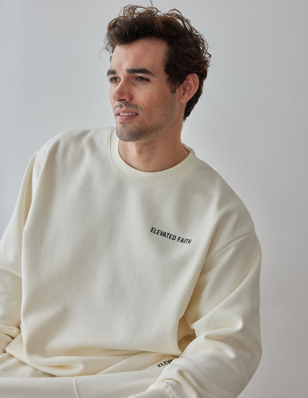 Elevated Faith Basics White Sand Unisex Crewneck — lifestyle context