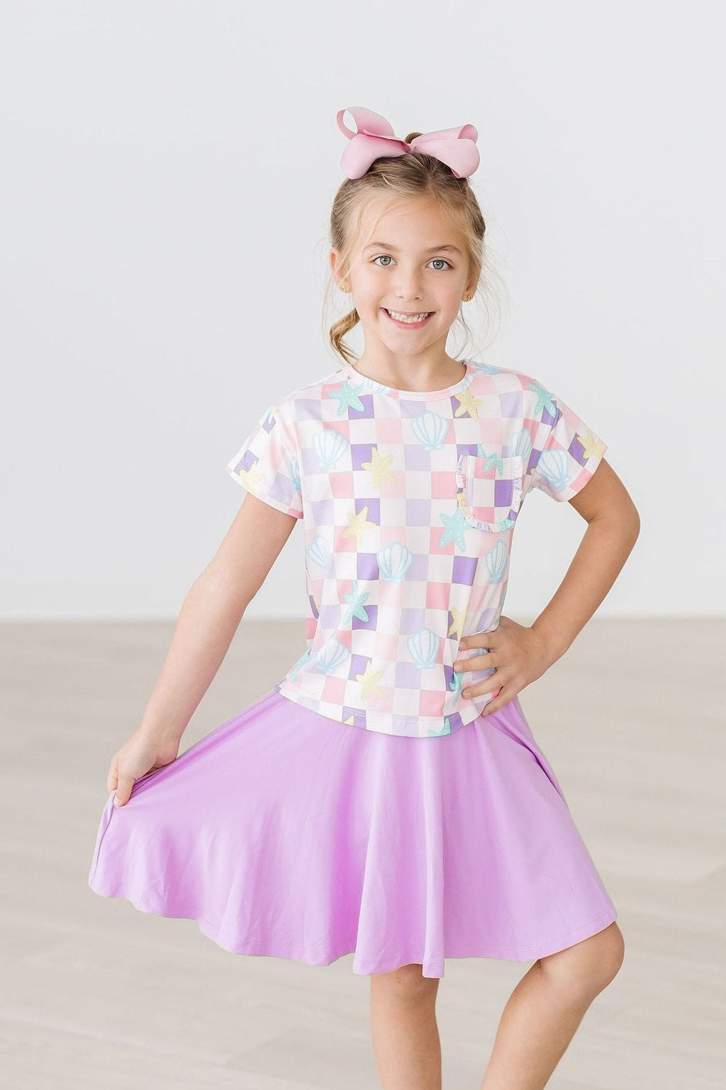 Mila & Rose ® Beach Days Ruffle Pocket Tee — side view