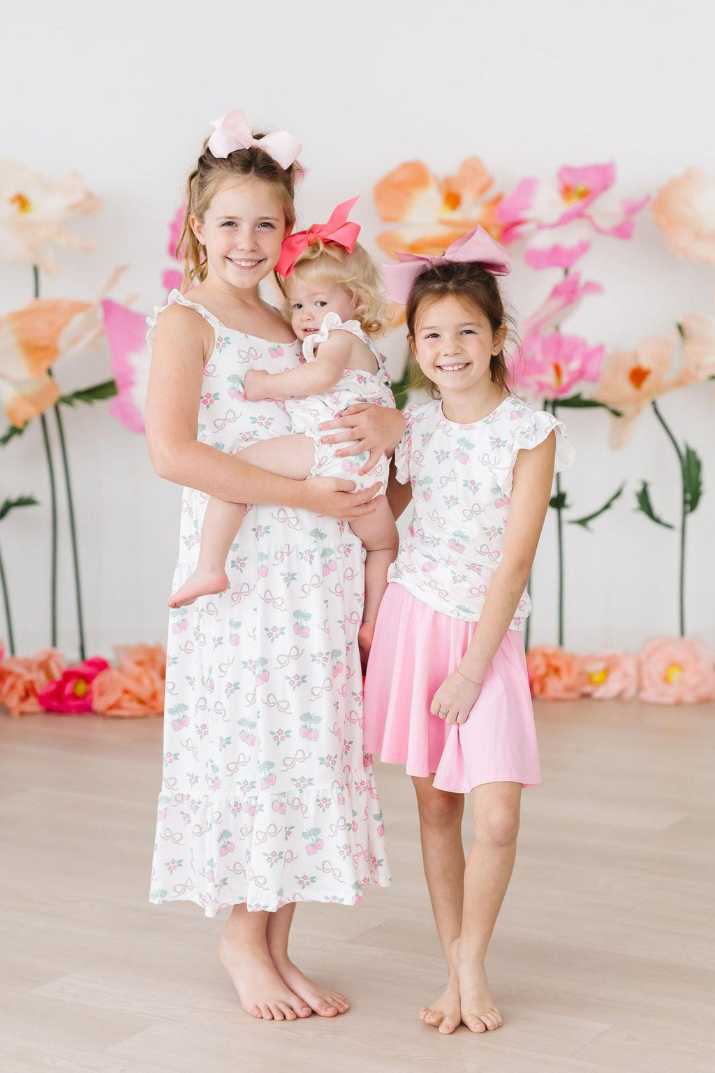 Mila & Rose ® Berries & Bows Ruffle Cross Back Romper — lifestyle context