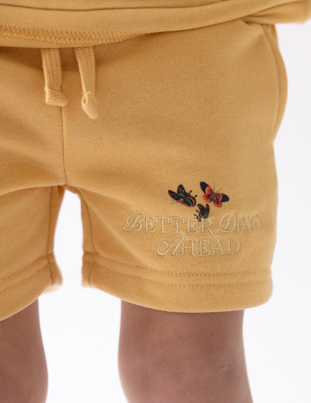 Elevated Faith Better Days Butterfly Kids Short — side view