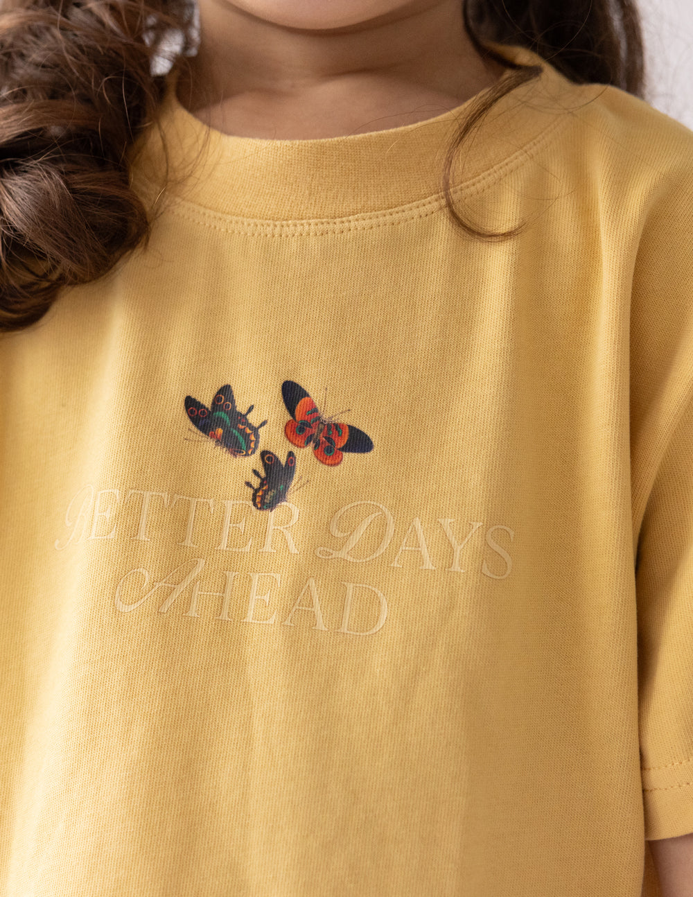 Elevated Faith Better Days Butterfly Kids Tee — side view