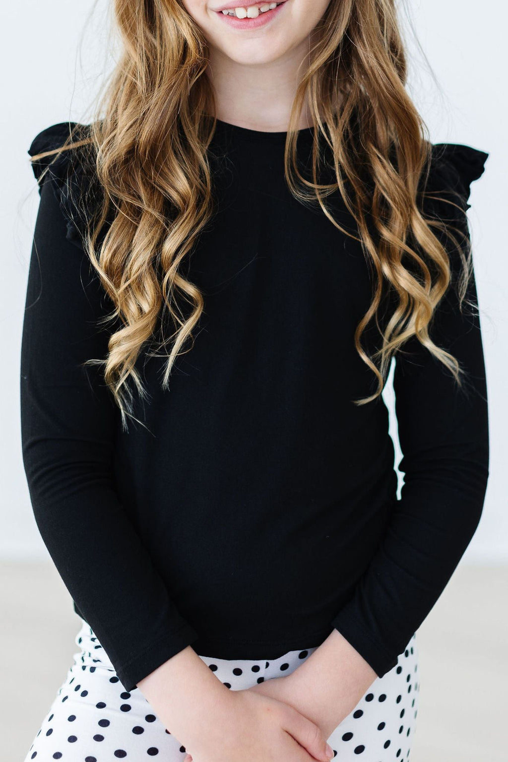 Mila & Rose ® Black L/S Ruffle Tee — side view