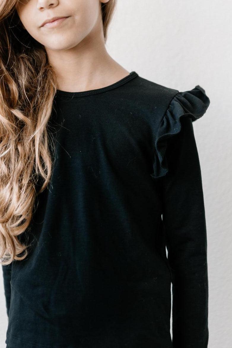 Mila & Rose ® Black L/S Ruffle Tee — lifestyle context