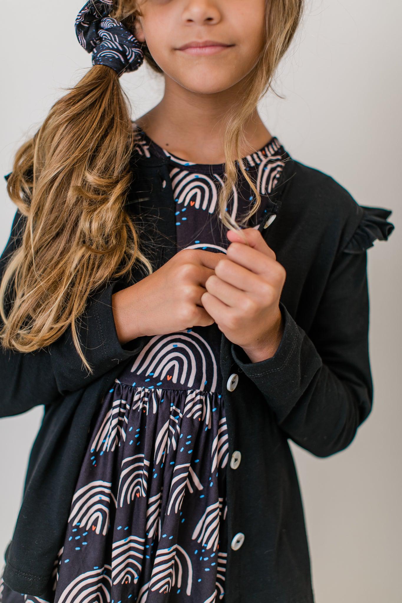 Mila & Rose ® Black Ruffle Cardigan — detail close-up