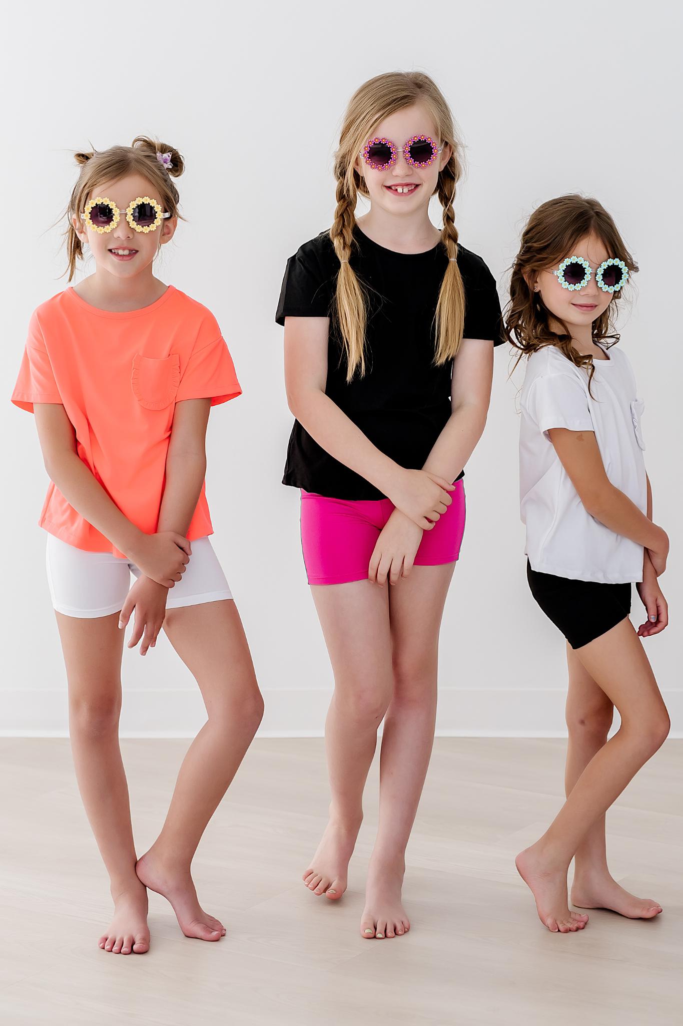 Mila & Rose ® Black Ruffle Pocket Tee — side view