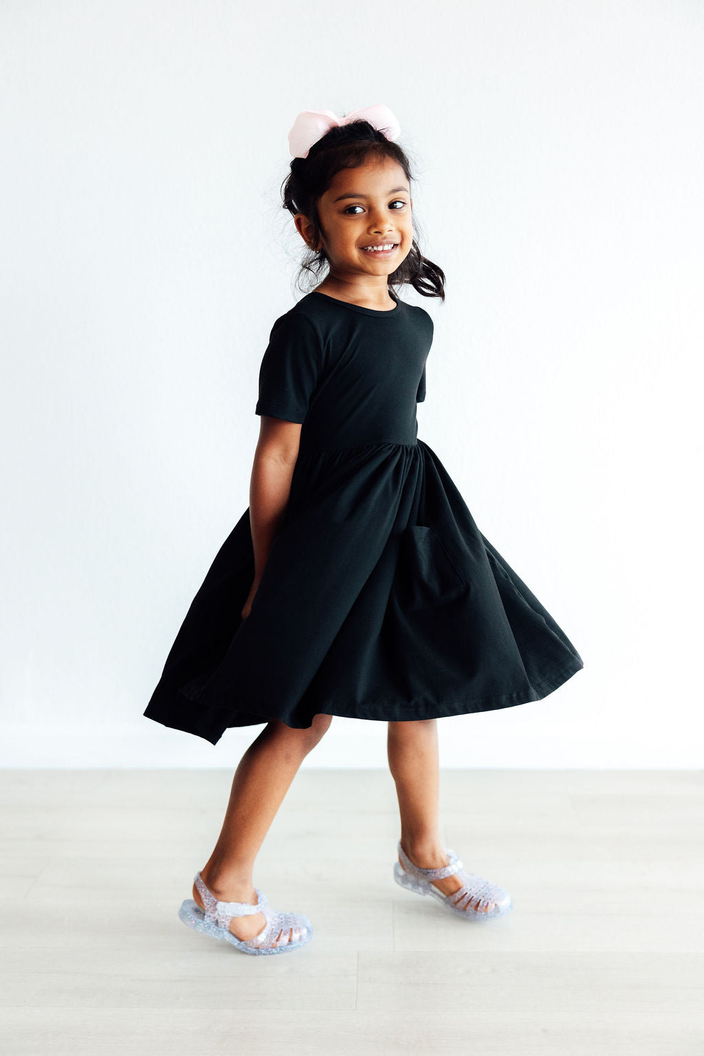Mila & Rose ® Black S/S Pocket Twirl Dress — lifestyle context