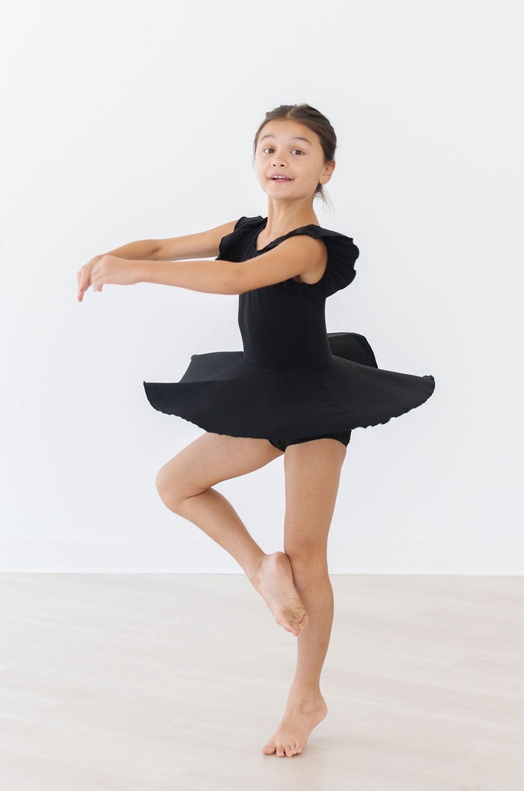 Mila & Rose ® Black S/S Twirl Leotard — side view