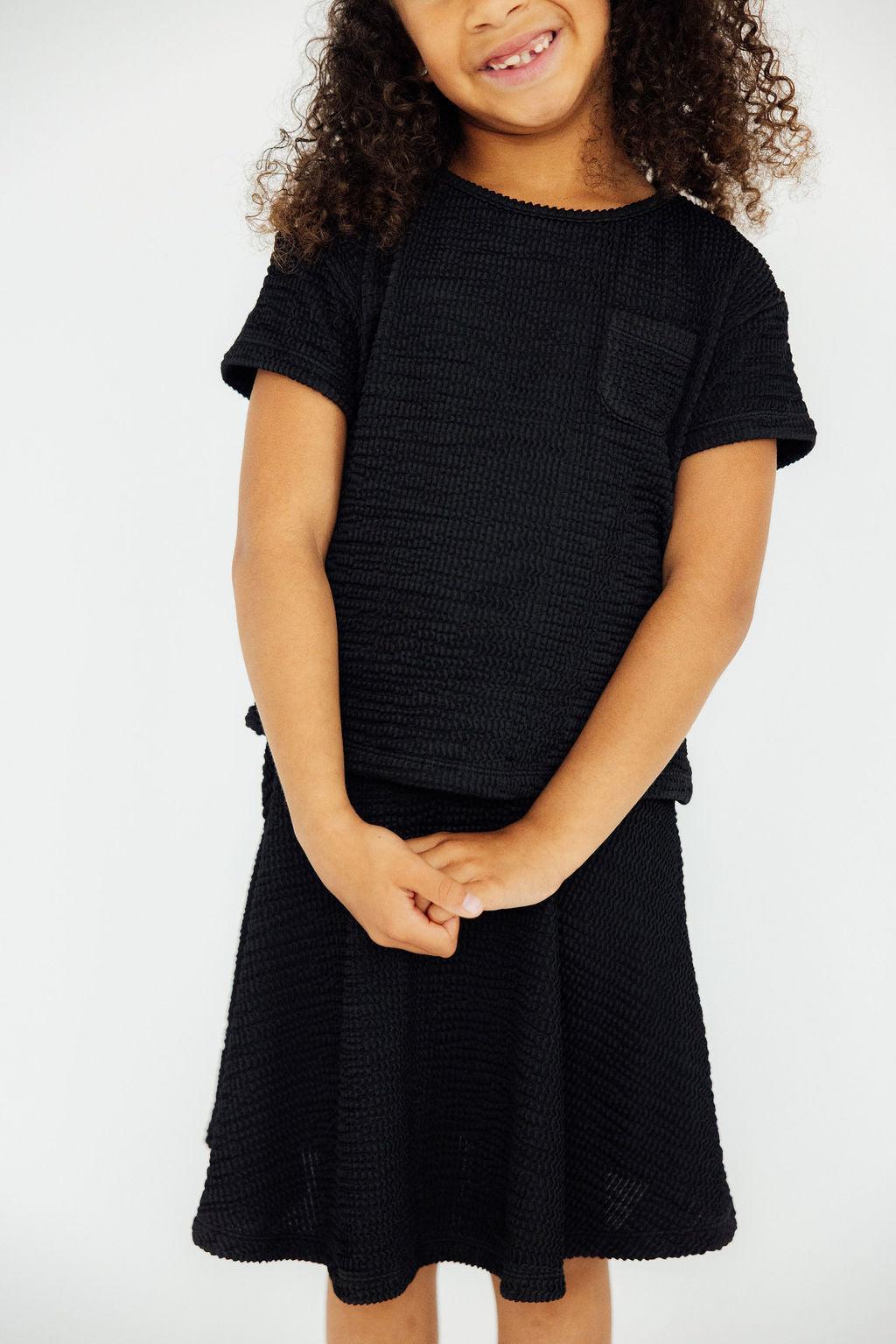 Mila & Rose ® Black Scrunchy Pocket Tee — main product shot