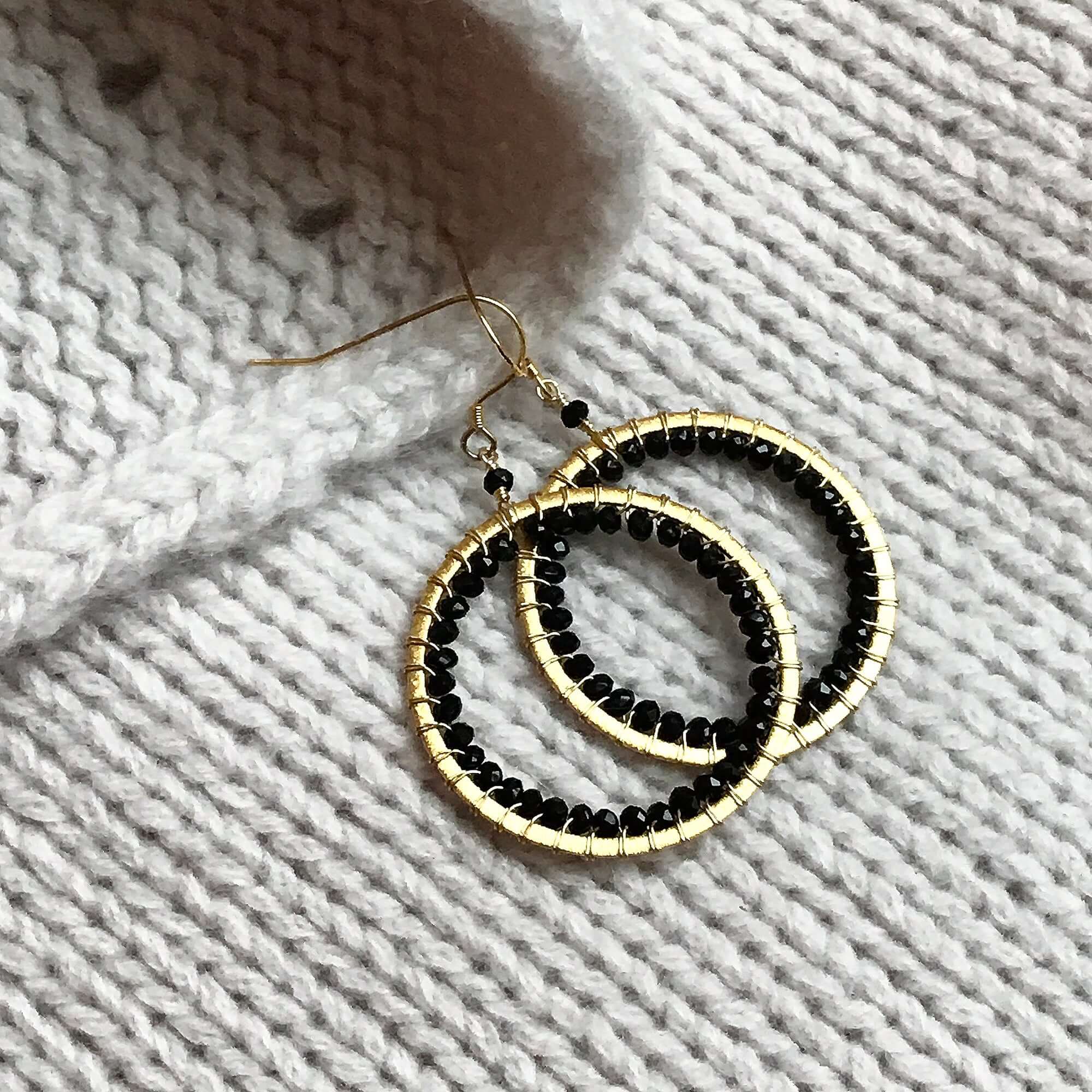 PARKEN JEWELRY Black Spinel Halo Earrings — detail close-up