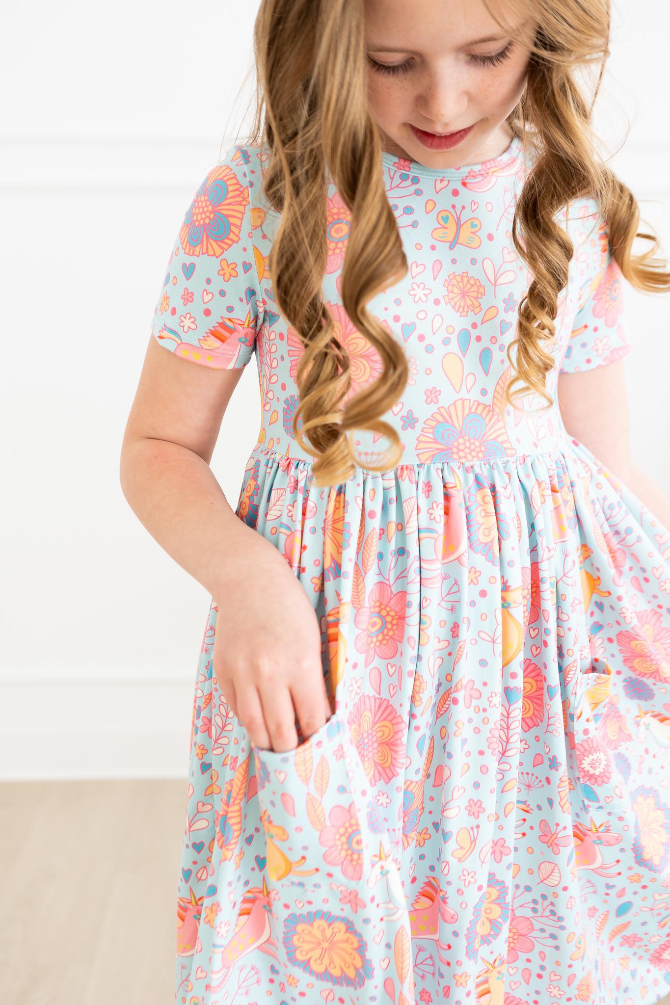 Mila & Rose ® SALE Blue Retro Unicorns S/S Pocket Twirl Dress — back view
